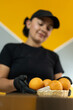 © Andrey - waitress with a basket full of delicious bunuelos or cheese breads, fresh and ready to enjoy.