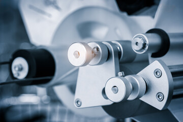 Poster - Automatic packaging conveyor line in pharmaceutical factory, close-up pharmaceutical industrial concept background