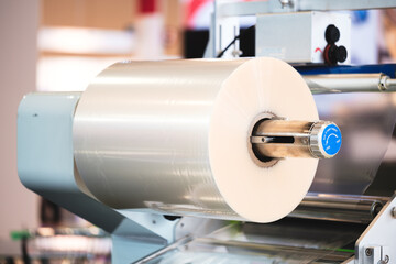 Poster - Automatic packaging conveyor line in pharmaceutical factory, close-up pharmaceutical industrial concept background