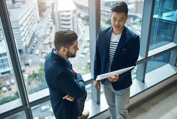 Canvas Print - Business, men and client with file at office for discussion on stock market and finances as asset manager. Male person, employee and conversation with customer for feedback or report on shares