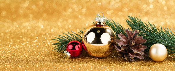 Sticker - red and gold christmas balls on golden bokeh background