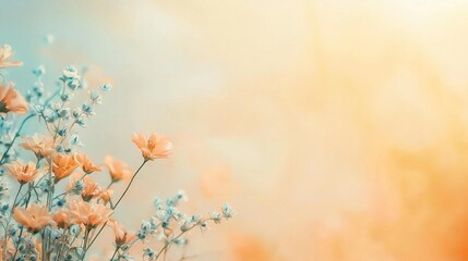 Canvas Print -   A close-up of vibrant flowers against a blue-orange backdrop with a hazy sky in the background