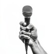 © musa - A hand holding a microphone against a white background.