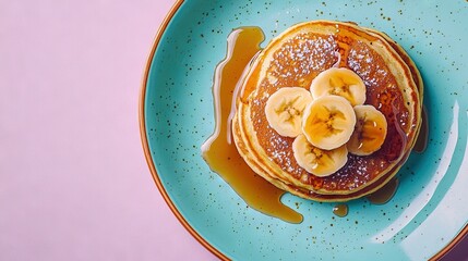 Poster -   A plate of golden pancakes topped with sliced bananas and drizzled with sweet maple syrup