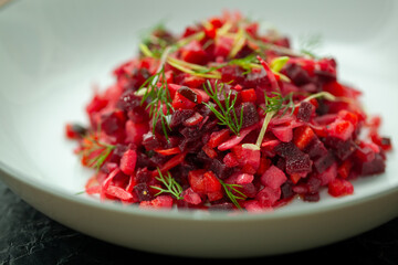 Enjoy a vibrant beetroot salad with dill and olive oil dressing in a clean white bowl, perfect for a healthy lifestyle