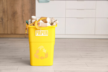 Poster - Full trash bin with PAPER sign in kitchen. Recycling concept