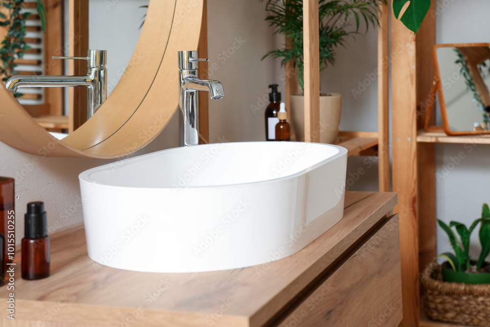 Ceramic sink on drawers in bathroom, closeup