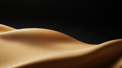 Wall Mural - smooth golden wave shapes flow gently against a deep black backdrop, creating delicate shadows and a