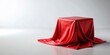 © Udomner - Empty cube with red silk cloth isolated on background , cube, red, silk, cloth, empty, isolated, background, minimalist