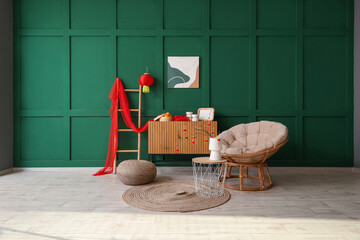 Sticker - Interior of festive living room with armchair and traditional Chinese decorations. Chinese New Year celebration