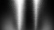 © GradPlanet - a shiny metal texture with a black background