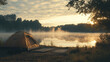 © Vocket - A serene camping scene with a tent set up by a lake, with morning mist rising over the water
