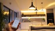 © sirisakboakaew - Smart home lighting automation: Remote control and voice command for automated lights and dimming schedules