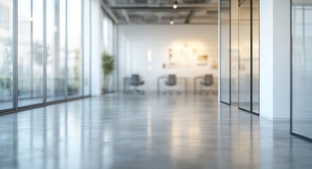 Wall Mural - Blurred background of a modern office interior with glass windows and a polished concrete floor, providing ample copy space for text. 