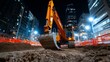 © Atchariya63 - Excavator working at night in an urban construction site.