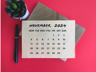 Month, time and calendar concept. Calendar for month of NOVEMBER  2024. On blurred styled background.