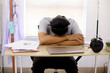 © Gatot - Young Asian Male Medical Student Sleeping On Desk After Tired Learning