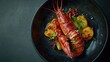 © Лаra Wladdim - Boiled lobster with vegetables on a black stone plate. Seafood. Top view. place for text