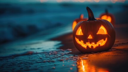 Wall Mural - halloween pumpkin lanterns on a beach at night