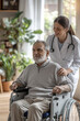 © Miljan Živković - Senior man in wheelchair with nurse take care of him