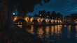 © buraratn - Night Scene of Illuminated Bridge Over Water