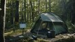 © VK Studio - A green tent and solar panel coexist in a sun-drenched forest, highlighting sustainability and outdoor comfort seamlessly integrated.