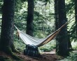 © HiSea - Hammock Camping in a Lush Forest with Backpack