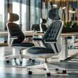 © visoot - A set of two modern office chairs with black fabric and white frames, each chair has an ergonomic headrest on the backrest.
