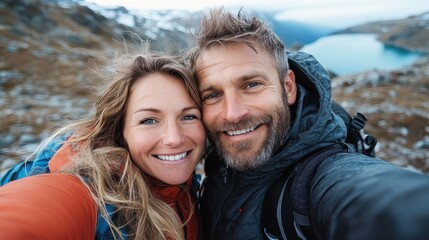 A couple poses happily together, standing by a stunningly beautiful mountain lake backdrop, symbolizing love, companionship, and the joy of traveling together.