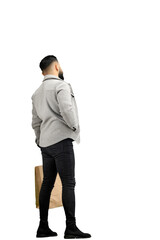 Wall Mural - A man, full-length, on a white background, with bags