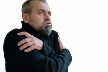 Frozen man shivering from cold weather on a white background. Winter cold concept