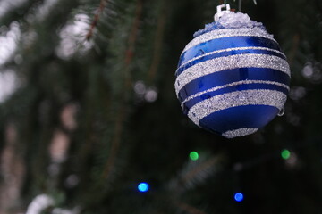 Christmas tree decoration blue ball with white stripes