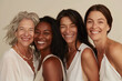 © Trissa - Studio portrait of senior women friends posing for camera