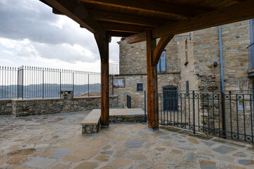 Sticker - A stone house in Guardia Perticara, a village in Basilicata in Italy.