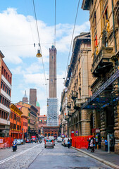 Naklejka na meble Via Rizzoli street and Towers of Bologna in background, Italy