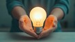 © Intelligent Horizons - Close up of Hands Carefully Molding and Crafting a Glowing Lightbulb from Clay Symbolizing the Process of Creative Idea Innovation and Entrepreneurial Spirit