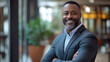 © Prasanth - successful smiling cheerful african american businessman executive stylish company leader .stock photo