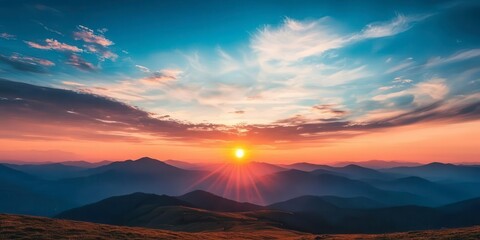 Stunning sunset over mountains with vibrant colors and dramatic sky.