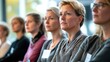 © jureephorn - Business women and colleagues attend workshop presentations Sit in a row and focus on the speaker. Professional meeting atmosphere