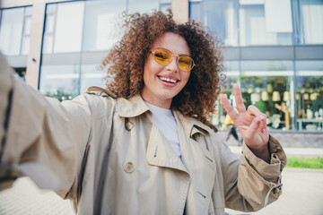 Poster - Photo of positive nice adorable girl dressed stylish beige clothes v-sign sunny weather outdoors