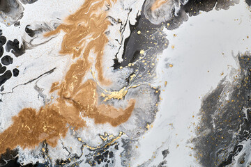 Abstract artwork with flowing gold  lines, resembling natural marble formations. The intricate textures and shimmering details, composition of organic beauty