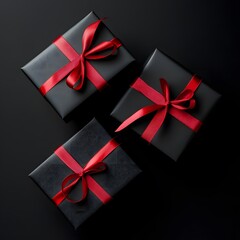 Gift boxes and red ribbon on it top view