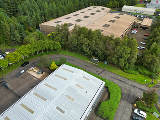 Aerial View of Industrial Estate at Livingston Town of Scotland United Kingdom. Footage Captured During Rainy and Cloudy Day with Drone's Camera on August 29th, 2024