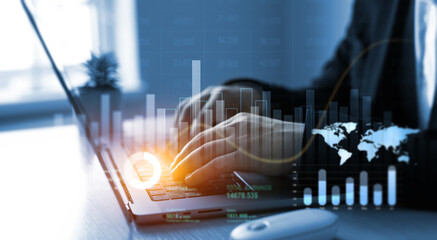 Leinwandbilder - Businessman using laptop for analyzing data sales and financial graph chart. Business development strategy,analysis and planning.Financial marketing graph and profit stock market.