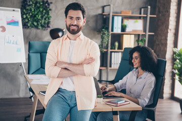 Poster - Photo of two young colleagues crossed arms collaboration loft interior office business center indoors