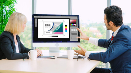 Graphic designer software for modern design of web page and commercial ads showing on the computer screen