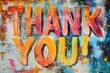 © Minerva Studio - Colorful thank you sign being displayed on painted wall
