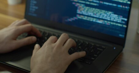 Closeup coding on screen, Man hands coding html and programming on screen laptop, development web, developer.