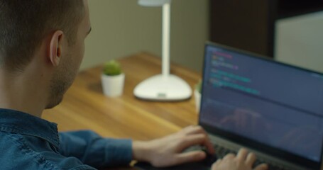 Closeup coding on screen, Man hands coding html and programming on screen laptop, development web, developer.