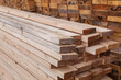 © kvdkz - Wooden planks. Beams. Air-drying timber stack. Wood air drying (seasoning lumber or wood seasoning). Timber. Lumber.